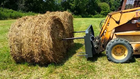 skid steer loading hay|skid steer forks.